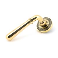 The Slender Classic Reeded Lever on Beehive Rose Set - Aged Brass on a White Background The Slender Classic Reeded Lever on Beehive Rose Set - Aged Brass on a White Background