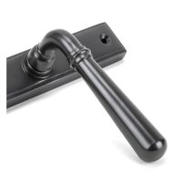The Slimline Lever Espagnolette Door Latch in Aged Bronze Close up of the Handle The Slimline Lever Espagnolette Door Latch in Aged Bronze Close up of the Handle