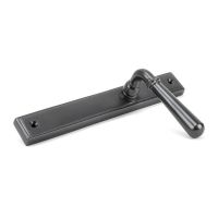 The Slimline Lever Espagnolette Door Latch in Aged Bronze Shown on its Side The Slimline Lever Espagnolette Door Latch in Aged Bronze Shown on its Side