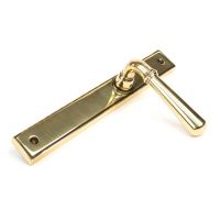 The Slimline Smooth Lever Espagnolette Door Latch in Aged Brass Shown on its Side The Slimline Smooth Lever Espagnolette Door Latch in Aged Brass Shown on its Side