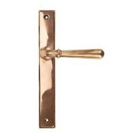 The Slimline Smooth Lever Espagnolette Door Latch in Polished Bronze on a White Background The Slimline Smooth Lever Espagnolette Door Latch in Polished Bronze on a White Background