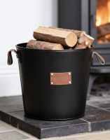 The Small "Wood" Black Log Basket on a Traditional Stone Hearth in a Contemporary Home - Digital Illustration The Small "Wood" Black Log Basket on a Traditional Stone Hearth in a Contemporary Home - Digital Illustration