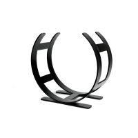 The Small Curved Fireside Log Holder in Matt Black Shown from an Angle on a White Backgroundv