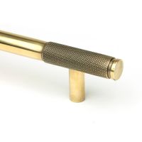 The Small Half Knurled Cabinet Pull Handle in Aged Brass Looking Close up of the End of the Knurled Handle