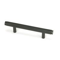 The Small Knurled Cabinet Pull Handle in Aged Bronze Shown Upright on a White Background The Small Knurled Cabinet Pull Handle in Aged Bronze Shown Upright on a White Background