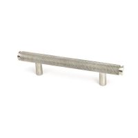 The Small Knurled Cabinet Pull Handle in Satin Stainless Steel Shown Upright on a White Background The Small Knurled Cabinet Pull Handle in Satin Stainless Steel Shown Upright on a White Background