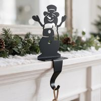 The Snowman Stocking Holder Displayed on a Mantelpiece in a Family home - Digital Illustration The Snowman Stocking Holder Displayed on a Mantelpiece in a Family home - Digital Illustration