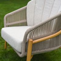 The Soria Woven 4-Piece Outdoor Lounge Set Showing a Close up of the Rope Weave on the Side of a Chair