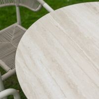 The Soria Woven 4-Seater Dining Set with a Close up of the Marble Effect Table Top