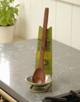 The Spoon Rest and Wooden Spoon - Huile D’Olive on a Marble Effect Kitchen Worktop - Digital Illustration The Spoon Rest and Wooden Spoon - Huile D’Olive on a Marble Effect Kitchen Worktop - Digital Illustration