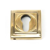 The Square Concealed Standard Euro Escutcheon - Aged Brass on a White Background The Square Concealed Standard Euro Escutcheon - Aged Brass on a White Background