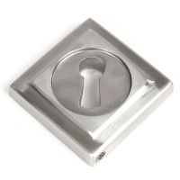 The Square Concealed Standard Keyhole Escutcheon in Satin Stainless Steel Showing Just the Backplate on a White Background