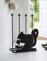 The Squirrel & Acorn Double Boot Holder Placed on a Cream Tiled Floor Entranceway