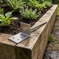 The Stainless Steel Railway Sleeper Concrete-In Base Anchor Placed on a Raised Flower Bed - Digital Illustration The Stainless Steel Railway Sleeper Concrete-In Base Anchor Placed on a Raised Flower Bed - Digital Illustration