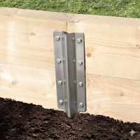 The Stainless Steel Railway Sleeper Straight Inline Spikes - Double on a White Background a Wooden Railway Sleeper Garden Planter