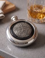 The Starfish Whiskey Flask on a Grey Kitchen Counter next to a Glass of Whiskey - Digital Illustration