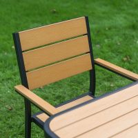 The Strata Slatted 4-Seater Outdoor Dining Set in Black Showing a Close up of The Panelled Backrest