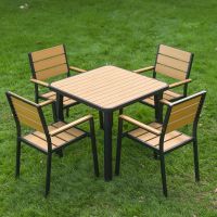 The Strata Slatted 4-Seater Outdoor Dining Set in Black Shown at a High Angle Displaying the Panelled Design