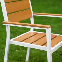 The Strata Slatted 4-Seater Outdoor Dining Set Showing a Side View of the Arm Rest on the Chairs
