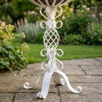 The "Stretton" Victorian Wrought Iron Basket Planter Stand in a White Finish Displaying the Decorative Scroll Work Base - Digital Illustration 