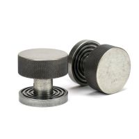 The Knurled Mortice/Rim Knob Set on a Beehive Rose in Pewter Shown Upright and on its Side The Knurled Mortice/Rim Knob Set on a Beehive Rose in Pewter Shown Upright and on its Side