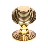 The Traditional Beehive Centre Door Knob on a White Background Shown Upright 