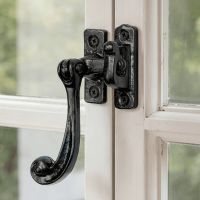 The Traditional Black Iron Window Casement Stay With Hook Plate Attached to a Vintage White Wooden Window Frame - Digital Illustration The Traditional Black Iron Window Casement Stay With Hook Plate Attached to a Vintage White Wooden Window Frame - Digital Illustration