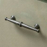 The Traditional Pewter Pull Handle Mounted on a Green Contemporary Kitchen Drawer - Digital Illustration 