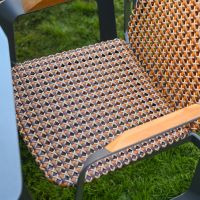 The Tribeca Weave 8-Piece Patio Dining Set Showing a Close up of the Woven Seat Design