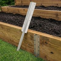 The Triple Galvanised Railway Sleeper Straight Inline Spikes in Brown next to a Raised Flower Bed - Digital Illustration