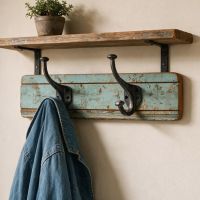 The Two Hooked Rustic Wood And Iron Coat Hooks Fitted on a Wall Underneath a Shelf - Digital Illustration The Two Hooked Rustic Wood And Iron Coat Hooks Fitted on a Wall Underneath a Shelf - Digital Illustration