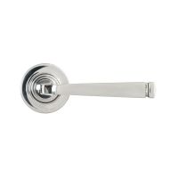 The Valen Tapered Sprung Handle Set on a Round Rose in Polished Stainless Steel Shown from the From the Front on a White Background