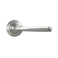The Valen Tapered Sprung Handle Set on an Art Deco Rose in Satin Stainless Steel Shown from the Front on a White Background