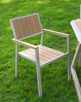 The Verve Quadrat 4 in Seater Outdoor Dining Set in Champagne Showing a Close of a Chair