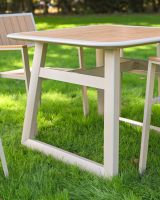 The Verve Quadrat 4 in Seater Outdoor Dining Set in Champagne Showing a Close up of the Legs of the Garden Furniture