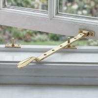 The Victorian Casement Window Stays Fitted on a White Wooden Open Window - Digital Illustration The Victorian Casement Window Stays Fitted on a White Wooden Open Window - Digital Illustration