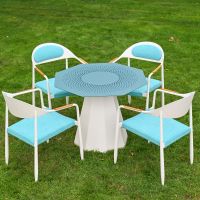 The Vortex Rotating Octagonal 4-Seater Outdoor Dining Set Shown Form a High Angle on a Garden Lawn