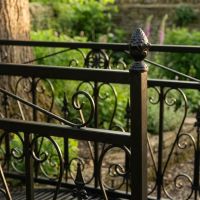 The Westminster Victorian Ornate Wrought Iron Garden Bridge in a Black Finish Showing a Close up of a Finial - Digital Illustration The Westminster Victorian Ornate Wrought Iron Garden Bridge in a Black Finish Showing a Close up of a Finial - Digital Illustration