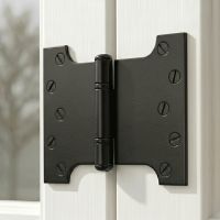The Wide Black Iron Parliament Hinge Pair Mounted on a Classic White Wooden Window Frame in a Country Home - Digital Illustration The Wide Black Iron Parliament Hinge Pair Mounted on a Classic White Wooden Window Frame in a Country Home - Digital Illustration
