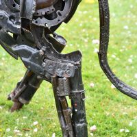 Close-up of the Legs on the Tiger Recycled Metal Parts Sculpture Close-up of the Legs on the Tiger Recycled Metal Parts Sculpture