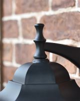 Close up of Tall Finial on Roof of Garden Lantern Close up of Tall Finial on Roof of Garden Lantern