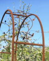 Close-up of the Floral Bird Design on the Top of the Rose Arch Close-up of the Floral Bird Design on the Top of the Rose Arch
