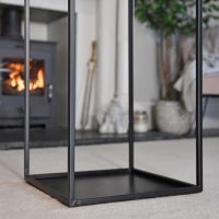 Close-up of the Base of the "Town House" Iron Log Rack