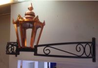 Copper Hexagonal Bow Bracket Light in Situ on a Wall