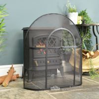 Traditional Black Arched Spark Guard In Living Room Setting