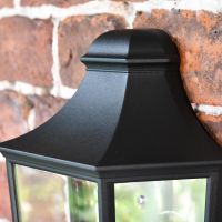 Close-up of the Top of the Traditional Black Flush Half Wall Lantern Close-up of the Top of the Traditional Black Flush Half Wall Lantern