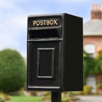 Close-Up of Traditional Black & Gold Post Box and Stand