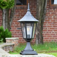 Traditional Black Tinted Pillar Light Standing on a Wall Traditional Black Tinted Pillar Light Standing on a Wall