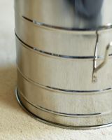 Close Up Of Traditional "Bromley" Coal Hod With Leather Handle Detailing