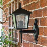 Traditional Bottom Fix Black Wall Lantern Installed On Brick Wall